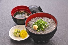 Raw whitebait on rice bowl