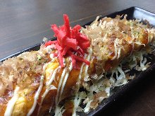 Tonpei-yaki (stir-fried cabbage and meat topped with egg)