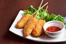 Fried cheese skewer