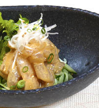 Thinly sliced sea bream sashimi