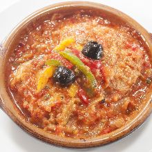 Simmered chicken in chilindron sauce