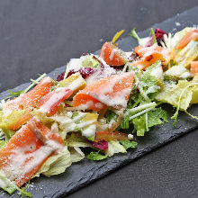Caesar salad with smoked salmon and avocado