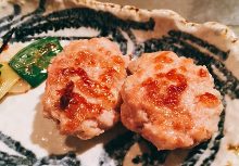 Meatballs served with egg yolk