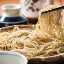 Buckwheat noodles served on a bamboo strainer