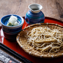 Buckwheat noodles served on a bamboo strainer