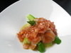 Asparagus wrapped with salmon served with fresh tomato dressing