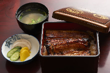 Eel served over rice in a lacquered box