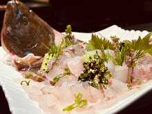 Olive flounder sugata-zukuri (sliced sashimi served maintaining the look of the whole fish)