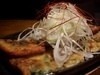 Korean Jeon Pancakes on Iron Plate with plenty of leek Korean Jeon Pancakes on Iron Plate with plenty of leek