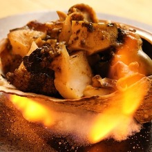 Grilled live abalone