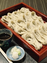 Buckwheat noodles served on a bamboo strainer