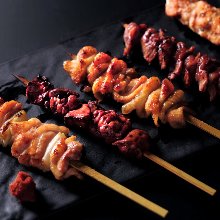 Assorted grilled chicken skewers