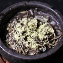 Stone grilled carbonara with black sesame seeds