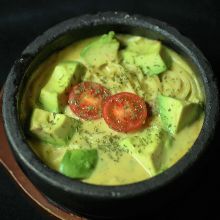 Stone grilled carbonara with avocado and basil