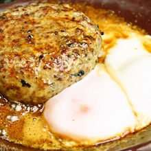 Meatballs served with egg yolk