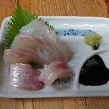 Thinly sliced sea bream sashimi