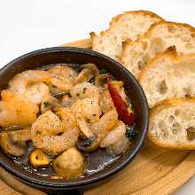 Shrimp al ajillo with baguette