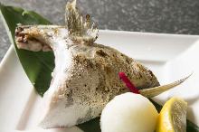 Salted and grilled fish head