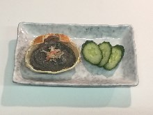Grilled crab meat and tomalley in shell