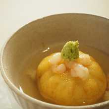 Dumplings poured with thick sauce