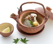 Matsutake steamed in an earthenware teapot