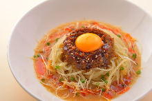 Chinese noodles topped with ground pork