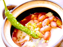 Simmered in tomato sauce