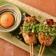 Meatballs served with egg yolk