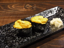 Raw sea urchin gunkan sushi rolls