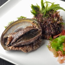 Grilled live abalone