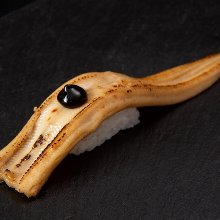 Nigirizushi topped with big-sized conger eel (anago)