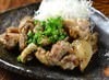 Char-grilled Sakurajima chicken leg served with seaweed salt and yuzu citrus and pepper