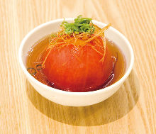 Scalded tomato steeped in dashi soup broth