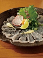 Thinly sliced thread-sail filefish sashimi