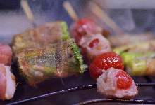 Pork wrapped tomato skewer