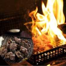 地頭鶏の火柱焼き