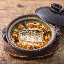 Earthen pot with sea urchin and salmon roe