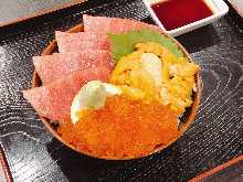 Sea urchin, fatty tuna, and salmon roe - luxurious three-colored rice bowl